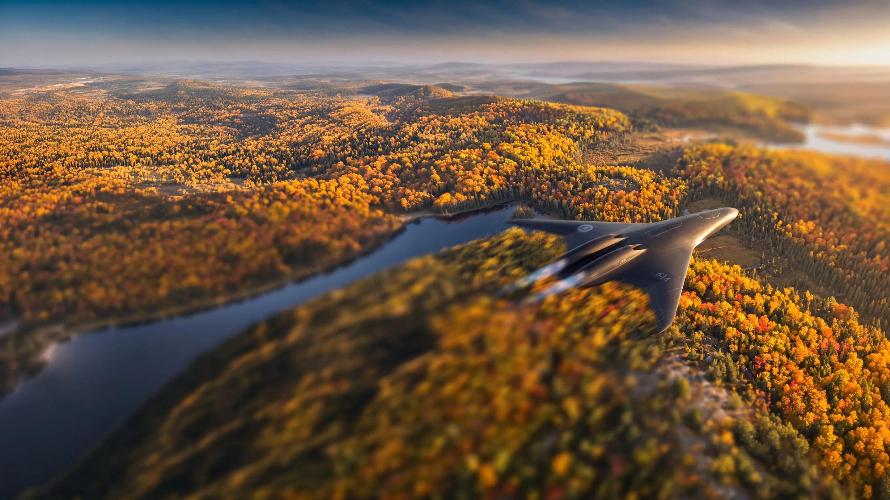 Scout banking over a river through autumn forest at sunset.