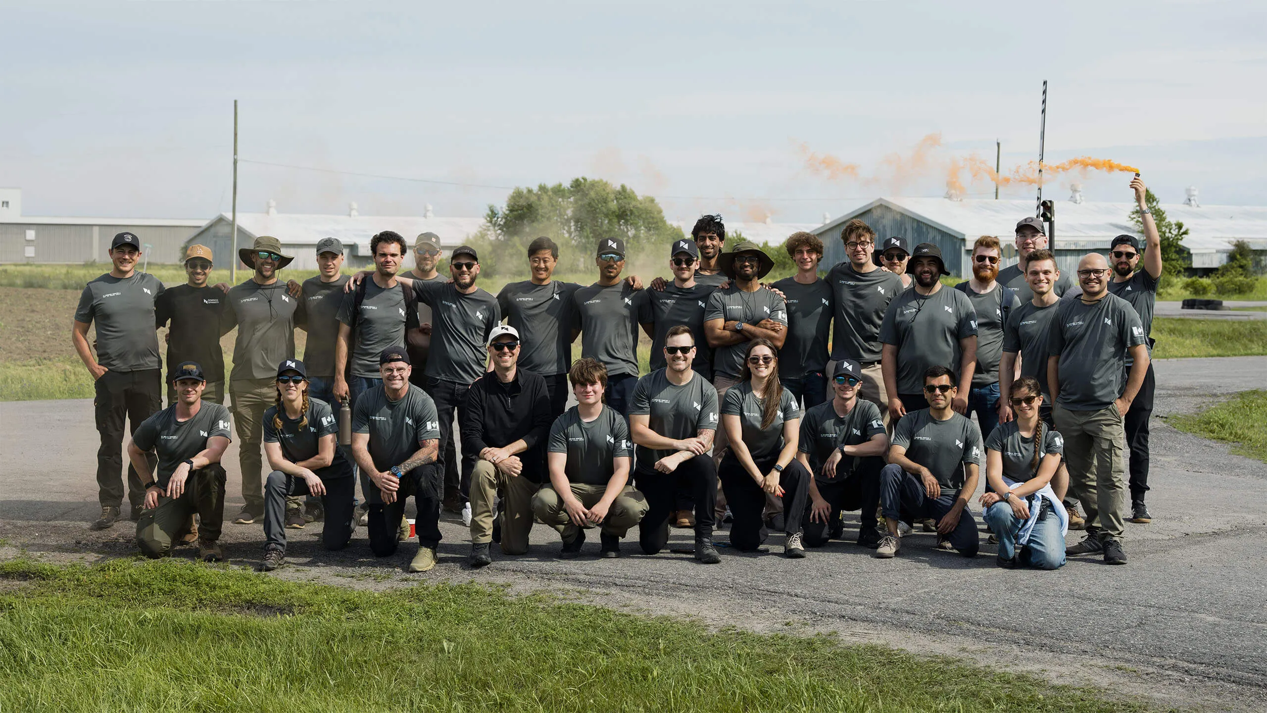 The Dominion Dynamics team gathered for a group photo at a field test.